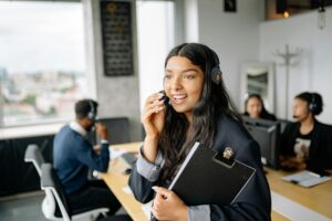 pretty woman talking on a headphones
